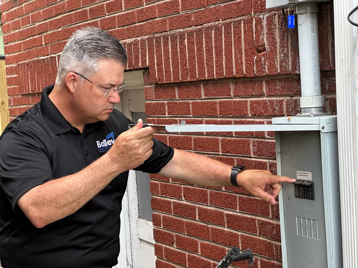 Tracy Bailey conducting a property inspection in Southern Indiana